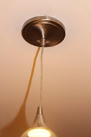 Handcrafted Pale Blue Upcycled Pendant Light made from a repurposed pinot grigio wine bottle